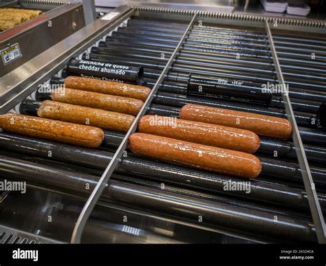 7-Eleven hot dogs endlessly spin on the grill at a franchise in New York on Wednesday, September ...