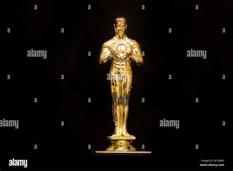 A golden Oscar replica trophy Stock Photo - Alamy