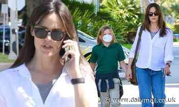 Jennifer Garner looks casual in a white shirt and jeans as she spends quality time with her son ...