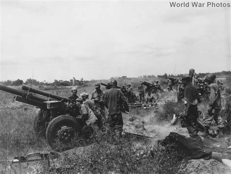 Field Artillery battery in action January 1945 - Battle of Luzon | World War Photos