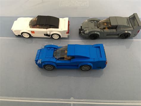 Three more custom LEGO cars.