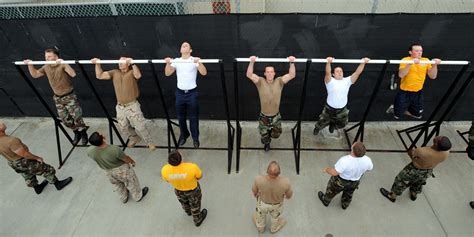 File:US Navy 080710-N-2959L-281 ailors perform pull-ups while taking a physical screening test ...