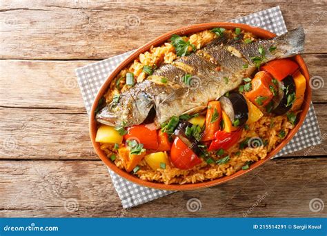 Thieboudienne Fish And Rice The National Food Of Senegal Closeup In The Dish. Vertical Top View ...