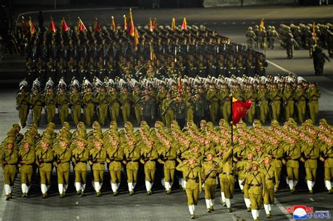 Seoul :North Korean soldiers take part in a military parade, attended ...