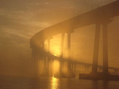 Royalty-Free photo: Bridge silhouette under sun | PickPik