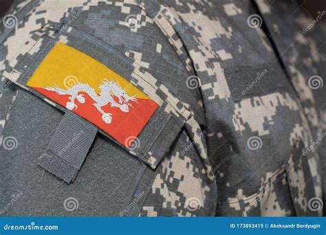 Bhutan Army Uniform Patch Flag on Soldiers Arm. Military Concept Stock ...