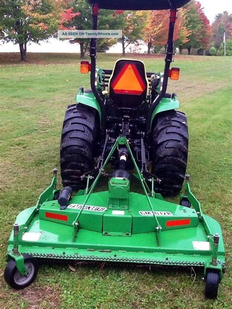 2006 4wd John Deere Tractor Loader/attachments