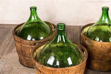 Antiques Atlas - Large Vintage Wine Bottles In Barrels