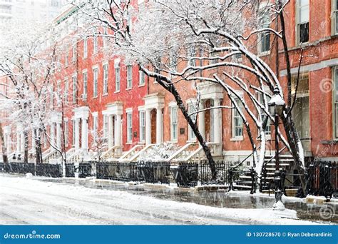 Snow Covered Winter Street Scene in New York City Stock Photo - Image of black, brownstones ...