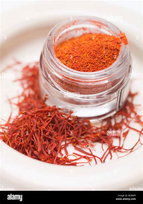 Saffron powder and saffron threads Stock Photo - Alamy