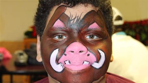 Image result for pumbaa face paint | Lion king, Lion king costume, Lion king musical