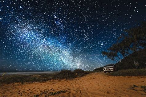 Starry sky at Double Island Point on the north shore of Noosa, Australia. | Beach night, Night ...