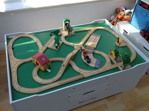 Advanced wooden train set featuring items from Brio 33208 Rail & Road Crane Set, Brio 33674 ...