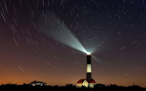 Download Architecture Light Night Star Sky Time Lapse Man Made Lighthouse HD Wallpaper