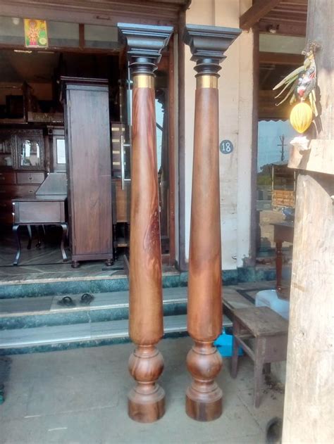 Palai wood pillars | Pooja room door design, Temple design for home, Wood pillars