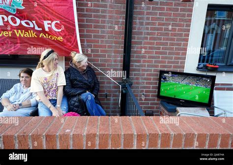 Liverpool fans watching the UEFA Champions League Final outside their ...