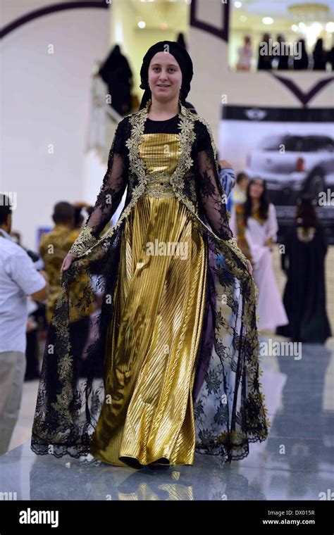 Sanaa, Yemen. 15th Mar, 2014. A model presents traditional Yemeni ...