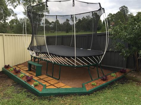 This is what we did with our trampoline area. Garden boxes where the ...