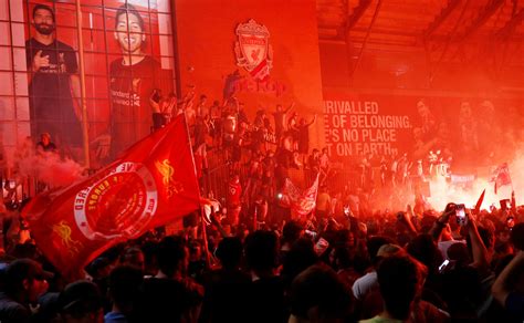 In pictures: Liverpool fans turn the city red after breaking 30-year ...