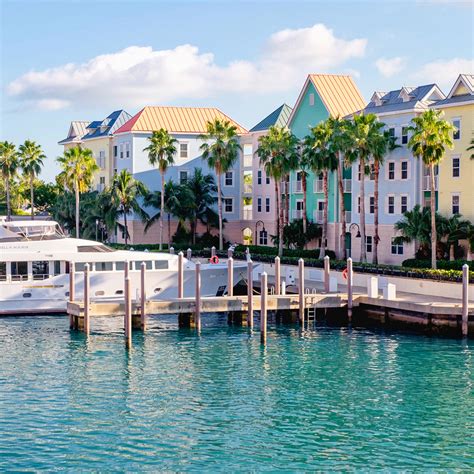 Boats parked on a dock of Downtown Nassau near Warwick Paradise Island ...