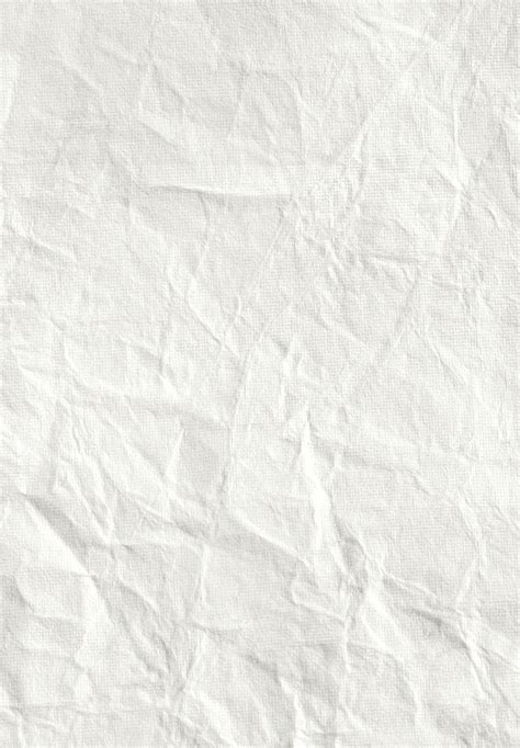 an old white paper textured with crinkled lines and scratches on the edges