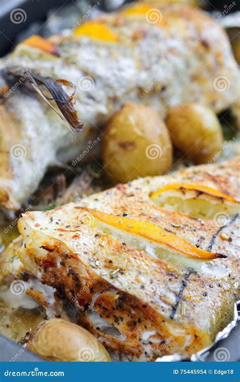 Baked Haddock with Lemon Slices and Small Potatoes Stock Photo - Image of piece, lunch: 75445954