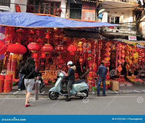 Vietnamese people sell Tet decorations Editorial Stock Image