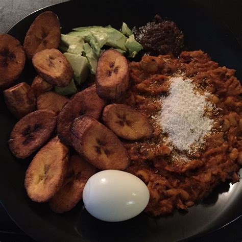 Fried Ripe Plantain and beans stew (redred) with Gari, avocado, egg and ...