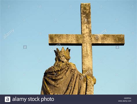 Baroque statue of Virgin Mary holding cross, at Festetics Palace, Helikon Castle Museum, in ...