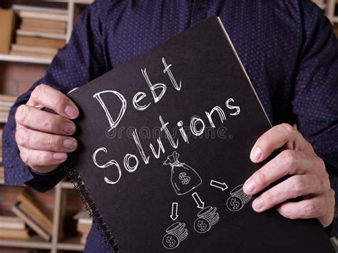 Debt Solutions are Shown on the Business Photo Using the Text Stock ...