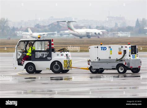 Airport luggage car Stock Photo - Alamy