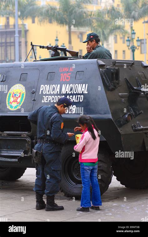 Policemen in crowd peru hi-res stock photography and images - Alamy