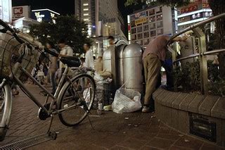 Sans-abri. | Homeless searching through garbage in the most … | Flickr