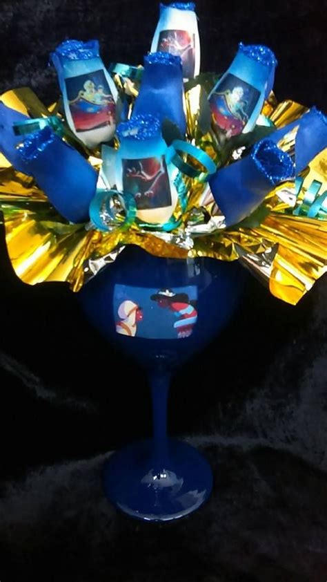 Here is a Aladdin Bouquet i made with princess Jasmine and her love ...