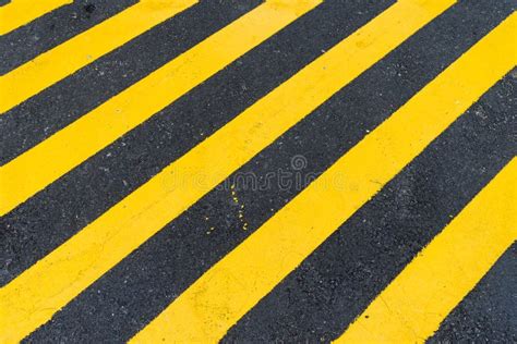 Asphalt Background with Diagonal Black and Yellow Warning Stripe Stock Image - Image of closeup ...