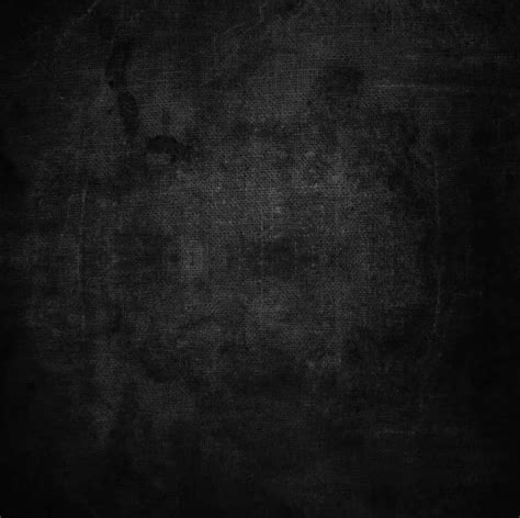 Abstract grunge texture on black fabric