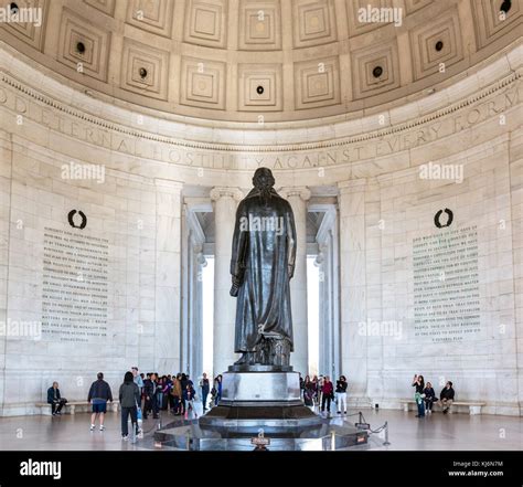 Jefferson Memorial. Visitors round the statue of Thomas Jefferson in ...