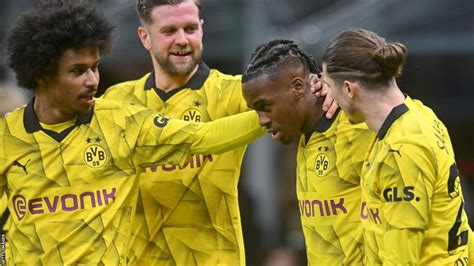 AC Milan 1-3 Borussia Dortmund: German side reach last 16 with away victory - BBC Sport