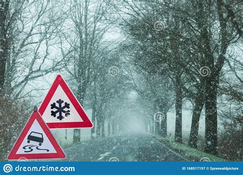 Snowfall with Warning Signs for Snowfall and Slipperiness Stock Image - Image of signs, reckon ...