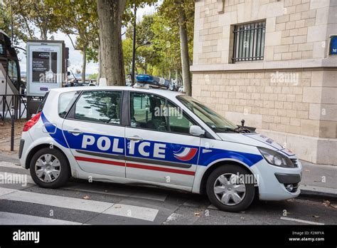 A French police car parked in a street in the European City of Paris ...