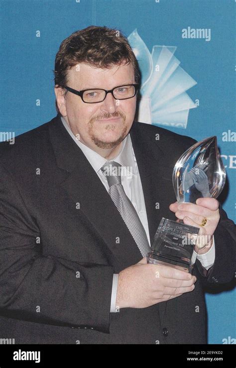 Michael Moore attends the pressroom of the 31st Annual People's Choice ...