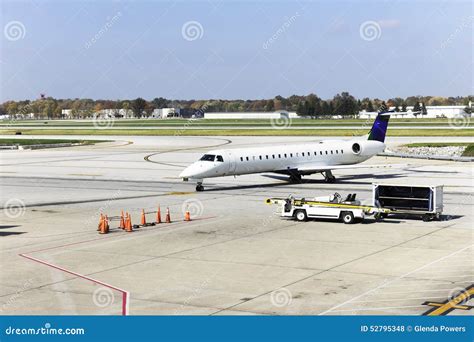 Airplane on the Tarmac stock photo. Image of white, autumn - 52795348