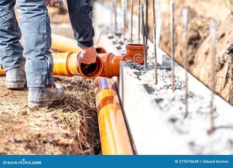 Installation of a Sewage Plastic Pipe during the Construction of a House Stock Photo - Image of ...