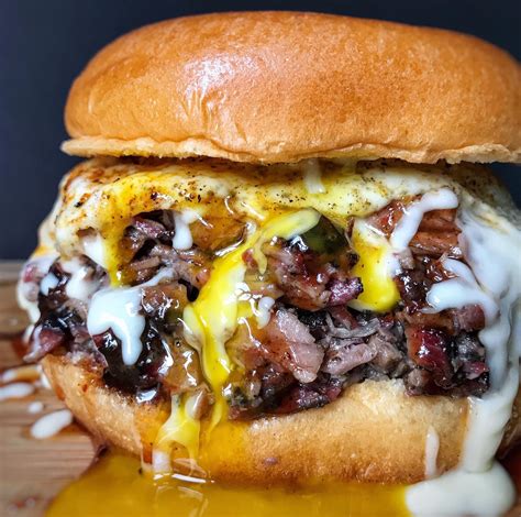[Pro/Chef] Hickory smoked chopped brisket sandwich with Cooper sharp American cheese sauce and a ...