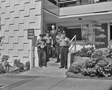 Police officers outside traffic control headquarters, 1962… | Flickr