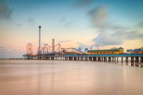 Galveston Pleasure Pier Sunset Photograph by Ray Devlin | Fine Art America