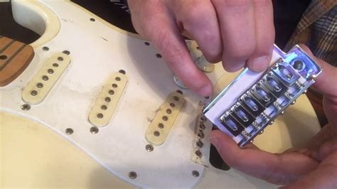 Install a bridge on a fender Stratocaster Squire: Parts from Musiclily.com - YouTube