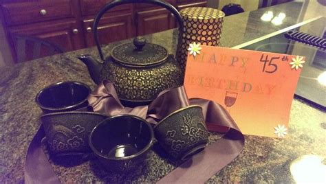 Got this cast iron teapot set and green tea for my Mom's 45th birthday! She couldn't stop ...
