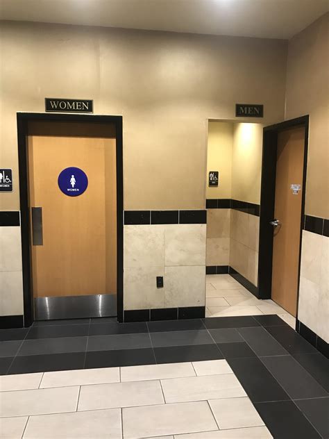 The entrance to the men’s bathroom at my local movie theater. : r/CrappyDesign