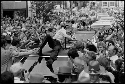 President Jimmy Carter greeting the crowd from the roof of his ...